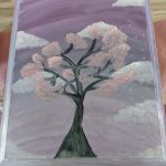 A pink tree painting displayed at Carlie's Art Gallery.