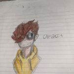 A drawing of a boy in a yellow hoodie displayed at Carlie's Art Gallery.