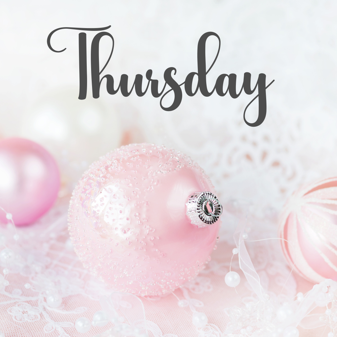 Virtual Work Wife - A pink Christmas ornament with beaded details sits among other ornaments and white decorations, with the word "Thursday" written above.